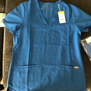 Royal blue size S 3 pocket scrub top